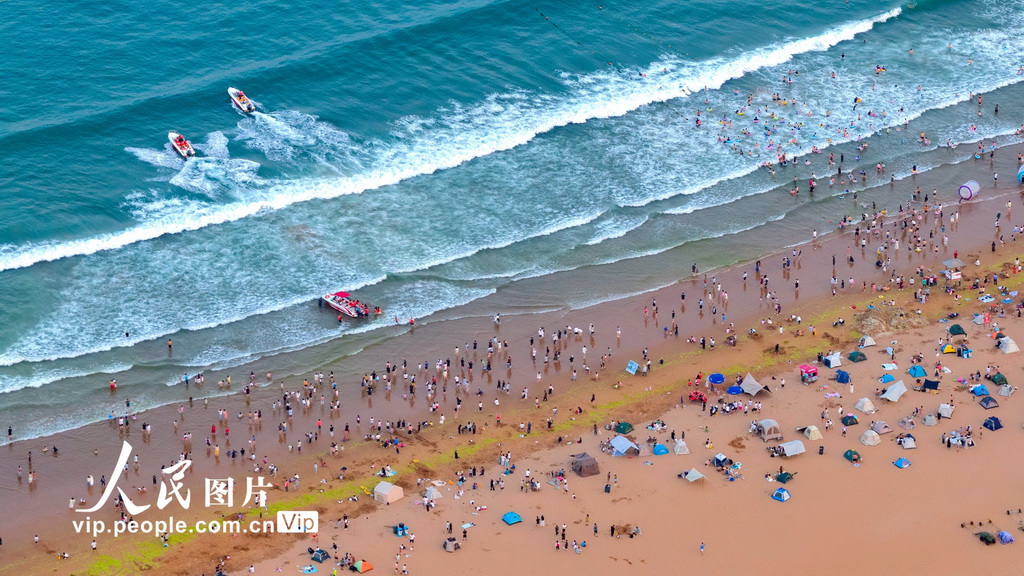 青島金沙灘海濱開啟“人從眾”模式【4】