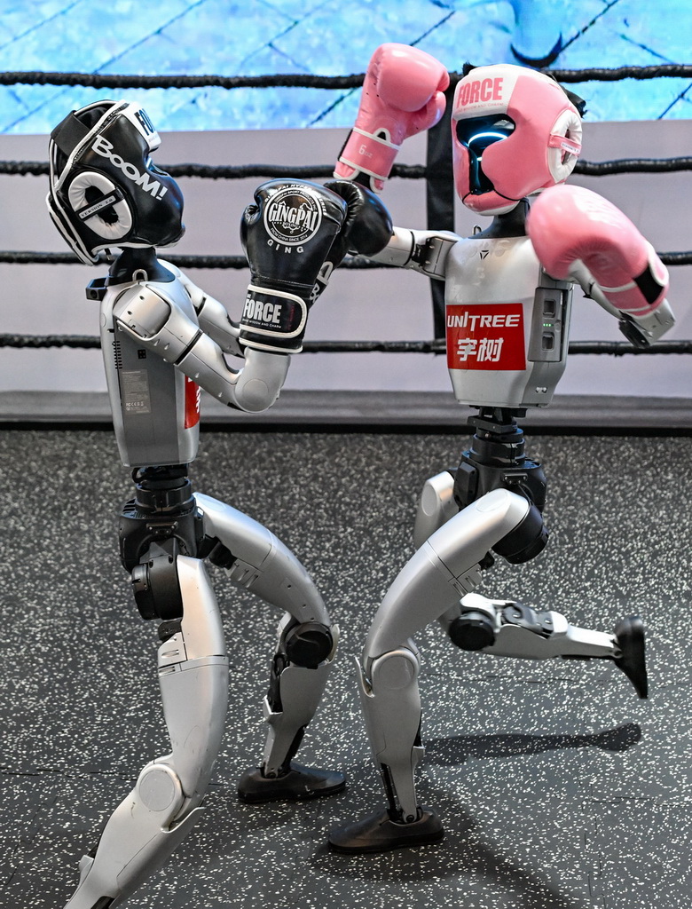 這是9月4日在2025世界智能產業博覽會宇樹科技展廳拍攝的機器人拳擊賽現場。新華社記者 王全超 攝